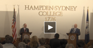 Screenshot of Josh Throneburg and Bob Good at podiums for the Candidates Forum at Hampden-Sydney College. The School's name and "1776" (its founding date) are on the cream-colored wall.