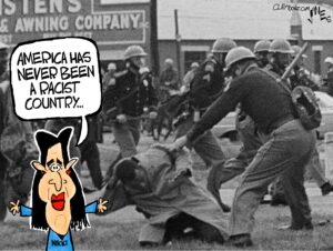Most of the image is a historical photo of Alabama state troopers beating African-American protesters with night sticks in Selma, Alabama. in the foreground is a cartoon of Nikki Haley, where she says "America has never been a racist country…"
