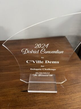 An engraved award from the 2024 Fifth District Convention on May 18. It says To Cville Dems for Delegate Challenge - 5-18-24 The Forward Fifth. The award is for getting a full number of possible delegates and alternates to the convention.