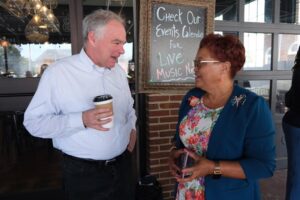 A photo of Senator Kaine speaking to VA 5th District candidate Gloria Witt.