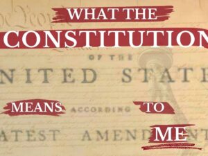 Blown up text of the US Constitution in the background in aged beige with the words "What the Constitution means to me" in big white letters highlighted in red.